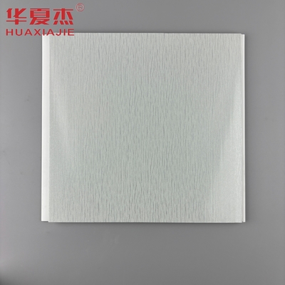 Panel de pared de PVC estampado en caliente Tablero base gris con patrón metálico plateado Panel de techo de PVC para decoración de sala de estar