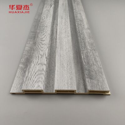 Buen precio Panel de pared de WPC gris con superficie laminada que ofrece una excelente resistencia a la humedad para la decoración interior en línea