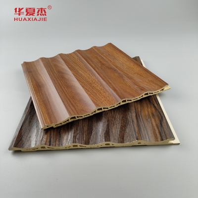 Precio de fábrica al por mayor Grano de madera Panel de pared de Wpc fluido Decoración interior de la casa