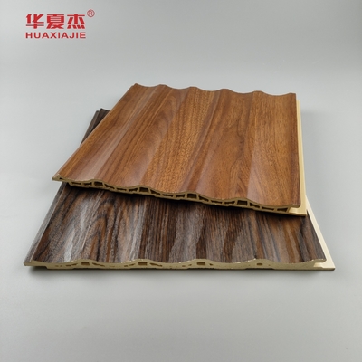 Precio de fábrica al por mayor Grano de madera Panel de pared de Wpc fluido Decoración interior de la casa