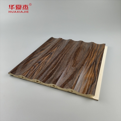 Precio de fábrica al por mayor Grano de madera Panel de pared de Wpc fluido Decoración interior de la casa