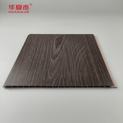 Venta al por mayor Panel de pared de madera oscura de grano de PVC resistente a la humedad Panel de techo de PVC Decoración de oficina