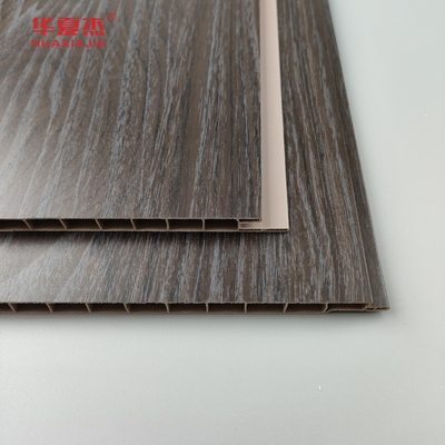Venta al por mayor Panel de pared de madera oscura de grano de PVC resistente a la humedad Panel de techo de PVC Decoración de oficina