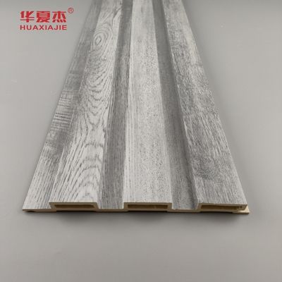 En general, el diseño de la madera gris de paneles Wpc de fluido para decoraciones de paredes para el hogar