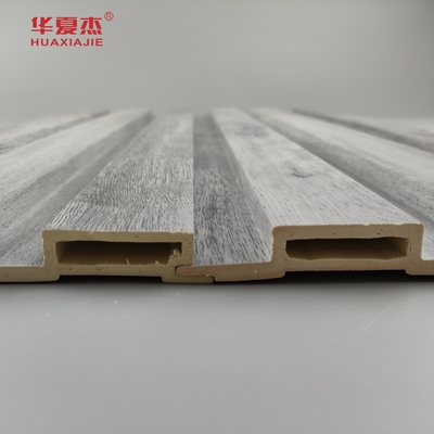 En general, el diseño de la madera gris de paneles Wpc de fluido para decoraciones de paredes para el hogar