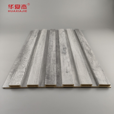 En general, el diseño de la madera gris de paneles Wpc de fluido para decoraciones de paredes para el hogar
