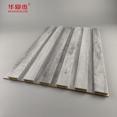 En general, el diseño de la madera gris de paneles Wpc de fluido para decoraciones de paredes para el hogar