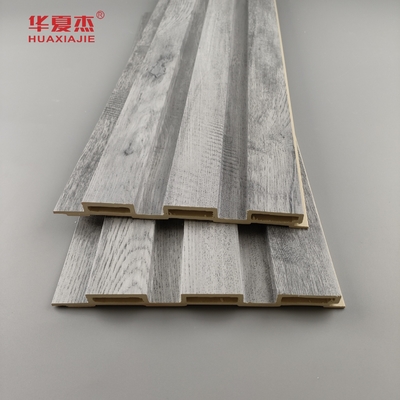 En general, el diseño de la madera gris de paneles Wpc de fluido para decoraciones de paredes para el hogar