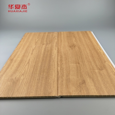 Venta al por mayor de paneles de pared de pvc de granos de madera de naturaleza paneles de techo de pvc antiagravajes para decoración residencial