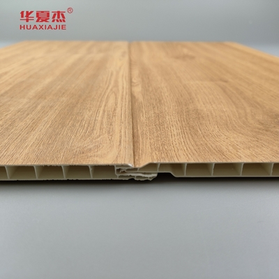 Venta al por mayor de paneles de pared de pvc de granos de madera de naturaleza paneles de techo de pvc antiagravajes para decoración residencial