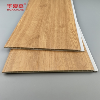 Venta al por mayor de paneles de pared de pvc de granos de madera de naturaleza paneles de techo de pvc antiagravajes para decoración residencial