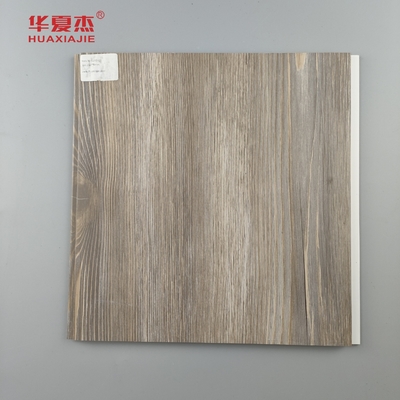 Venta directa de fábrica Panel de pared de PVC de madera laminada Granos de madera de PVC de decoración Panel de techo residencial / de oficina