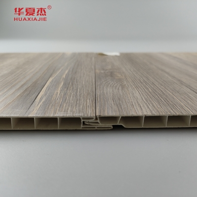 Venta directa de fábrica Panel de pared de PVC de madera laminada Granos de madera de PVC de decoración Panel de techo residencial / de oficina
