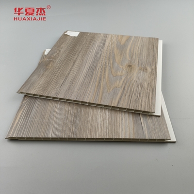 Venta directa de fábrica Panel de pared de PVC de madera laminada Granos de madera de PVC de decoración Panel de techo residencial / de oficina