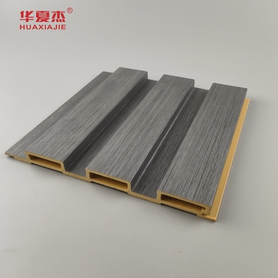 Nuevo producto Panel de pared laminado de madera de grano de Wpc Panel de pared laminado de madera de grano de madera de Wpc Instalar fácilmente decoración de paredes interiores