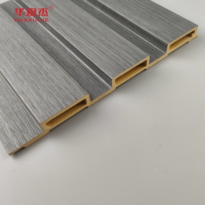 Nuevo producto Panel de pared laminado de madera de grano de Wpc Panel de pared laminado de madera de grano de madera de Wpc Instalar fácilmente decoración de paredes interiores
