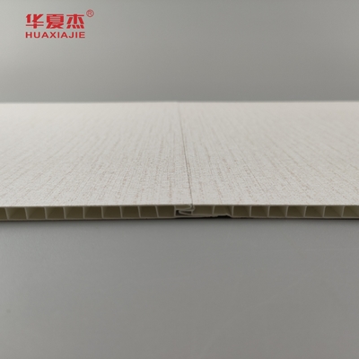 Ventas de fábrica paneles de pared de interior de PVC estampado en caliente granos de madera techo de PVC material de construcción a prueba de humedad