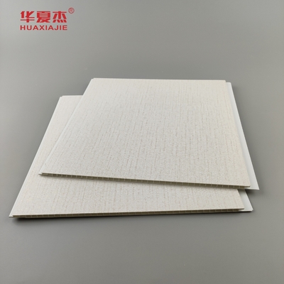 Ventas de fábrica paneles de pared de interior de PVC estampado en caliente granos de madera techo de PVC material de construcción a prueba de humedad