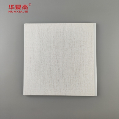 Ventas de fábrica paneles de pared de interior de PVC estampado en caliente granos de madera techo de PVC material de construcción a prueba de humedad
