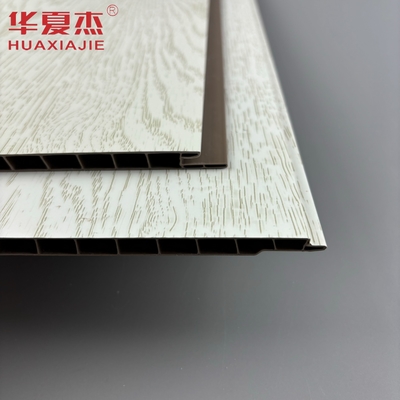 El panel de pared de PVC blanco laminado más vendido panel de decoración de techo de PVC de grano de madera simulado para apartamento