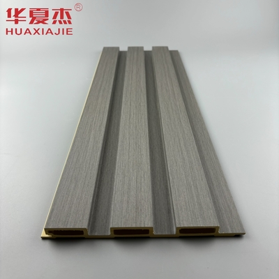 Venta al por mayor de paneles de pared wpc gris oscuro granos de madera wpc tableros de wpc acanalados decoración de paredes interiores