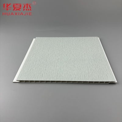 Panel de pared de PVC estampado en caliente Tablero base gris con patrón metálico plateado Panel de techo de PVC para decoración de sala de estar