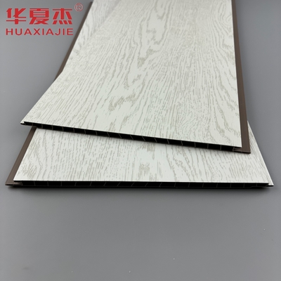 Buen precio Granos de madera blanca paneles de pared de PVC impermeables paneles de PVC decoración de edificios en línea