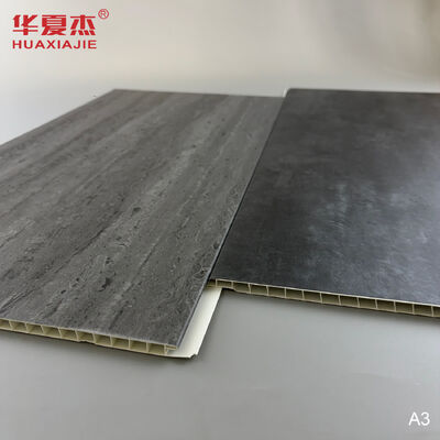 Calidad Panel de pared de PVC de mármol gris oscuro al por mayor con superficie de vetas de madera impermeable para decoración de interiores Fábrica